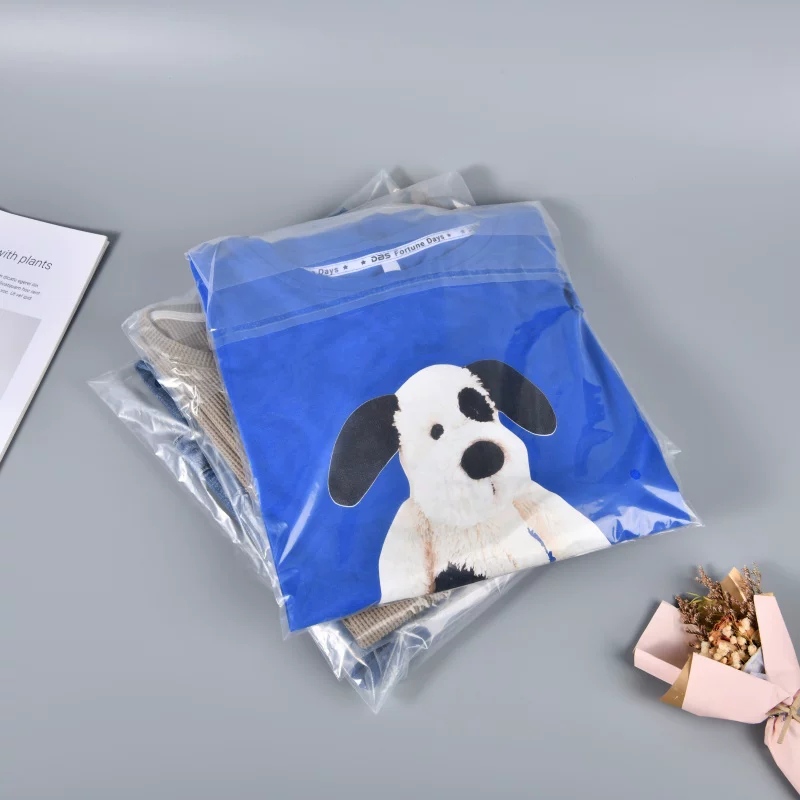 Custom recycled polybags protecting folded apparel for retail packaging