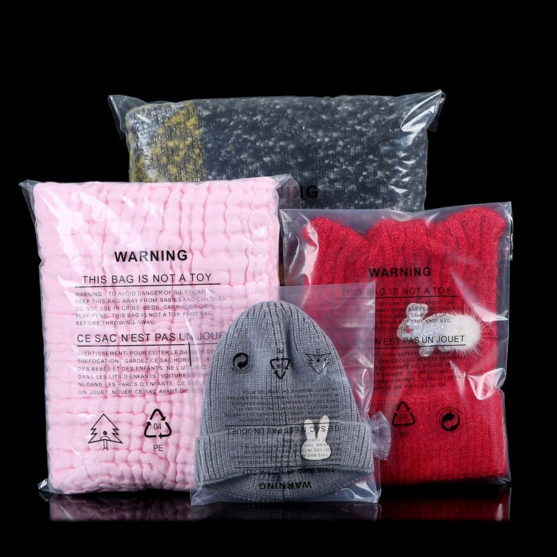 Custom Recycled Plastic Garment Bags with Printed Safety Warnings and Recycling Symbols for Clothing Packaging