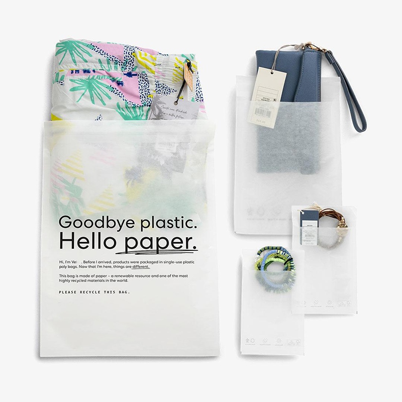 Translucent glassine paper bags with custom printed plastic-free retail packaging design